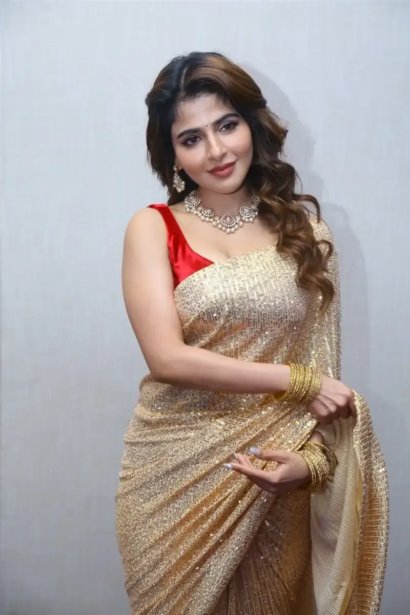 Iswarya Menon in Gold color Saree at Spy Movie Release Event